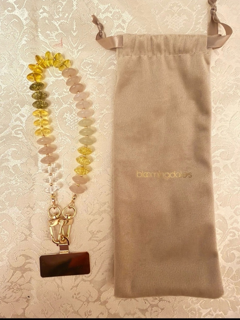 Bloomingdale's beaded phone wristlet strap